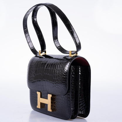 Hermès Constance 24 Verso Shiny Black Alligator and Rouge H with Gold Hardware