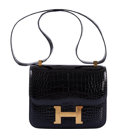 Hermès Constance 24 Verso Shiny Black Alligator and Rouge H with Gold Hardware