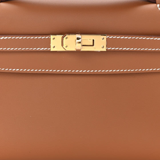 HERMES Swift Kelly Pochette Clutch Gold